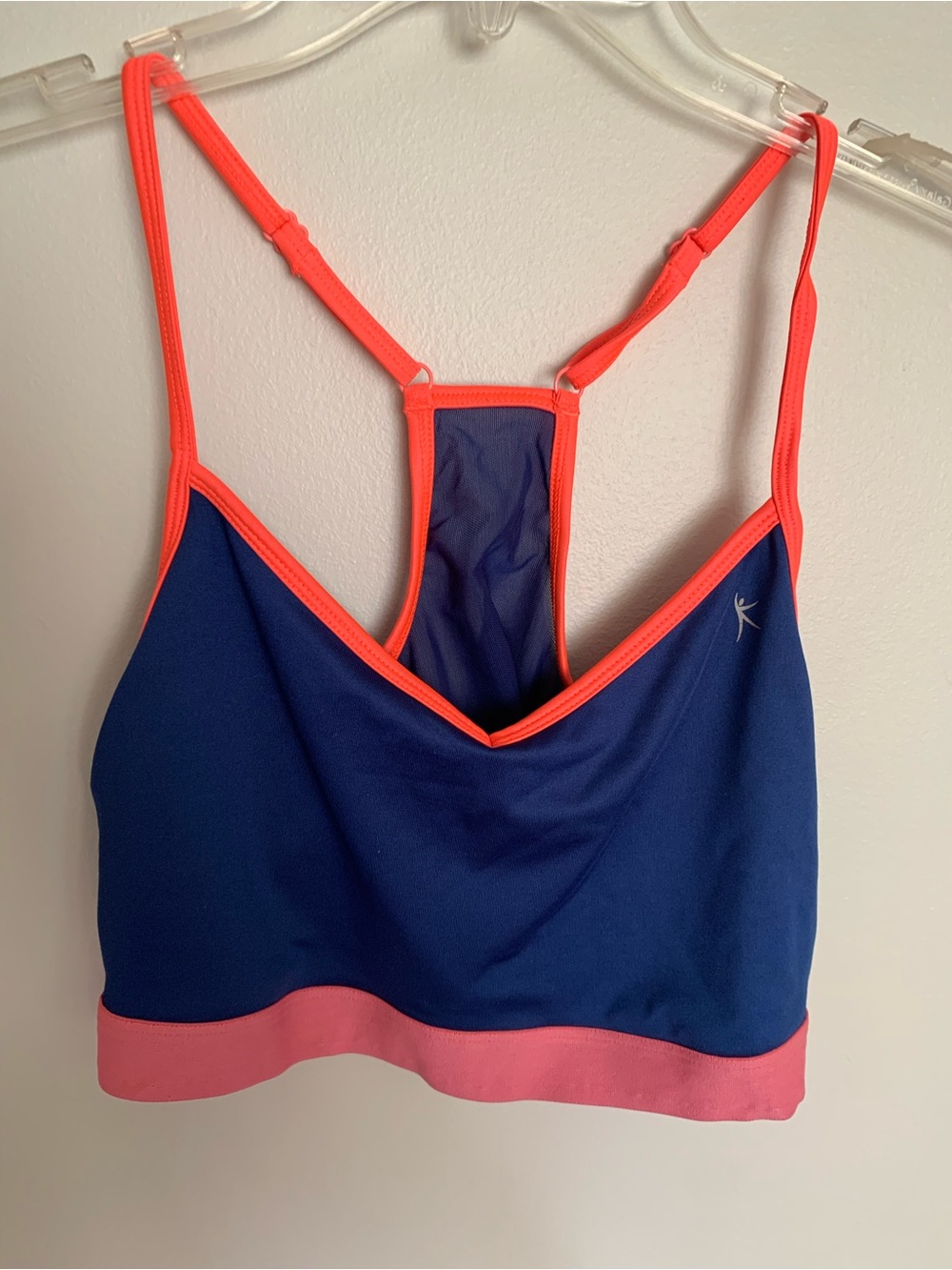 Woman’s Dakine Navy Sports Bra with Coral Trim and Pink Band. Size L/G 12-14
